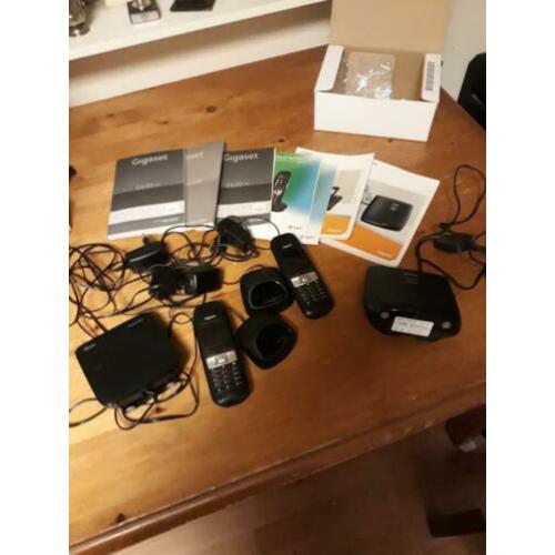 telefoon setje met een kpn bassisstation en een repeater