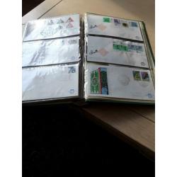 Album met eerstedag envenloppen en set briefkaarten