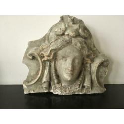 Antiek gevel ornament van steen. Decoratie Vintage Brocante