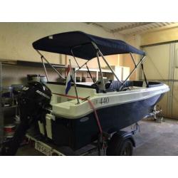 Mooie veelzijdige boot met moter en trailer!