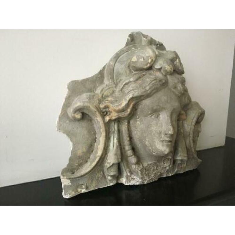 Antiek gevel ornament van steen. Decoratie Vintage Brocante