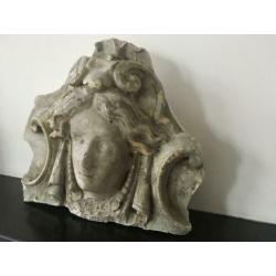 Antiek gevel ornament van steen. Decoratie Vintage Brocante