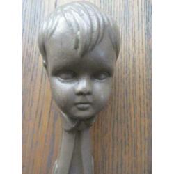 Oude celluloid rammelaar gezicht 17 cm