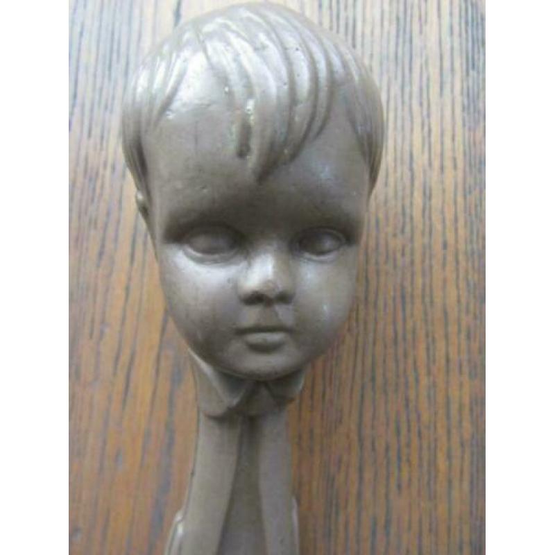 Oude celluloid rammelaar gezicht 17 cm