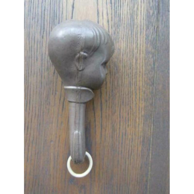 Oude celluloid rammelaar gezicht 17 cm