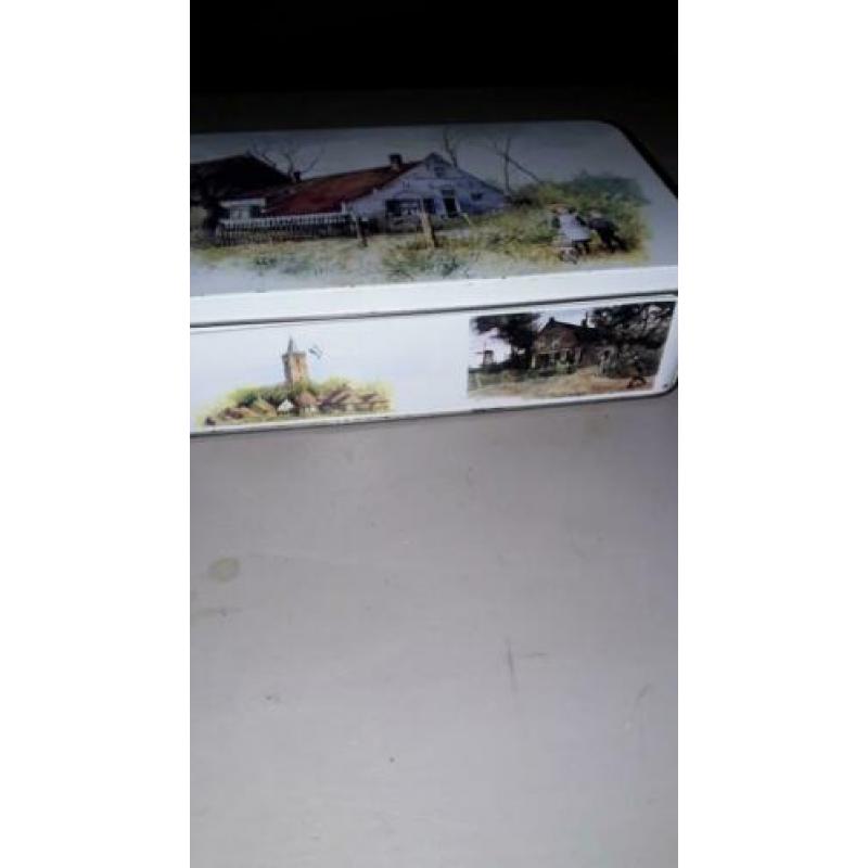 Oud koekblik met schilderingen Rien Poortvliet