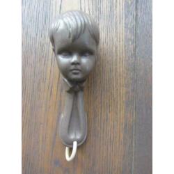 Oude celluloid rammelaar gezicht 17 cm