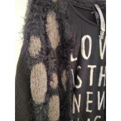 Vest met bijpassend shirt.