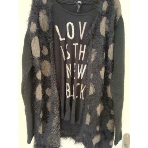 Vest met bijpassend shirt.