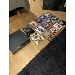 PS3 met 12 spellen en controllers