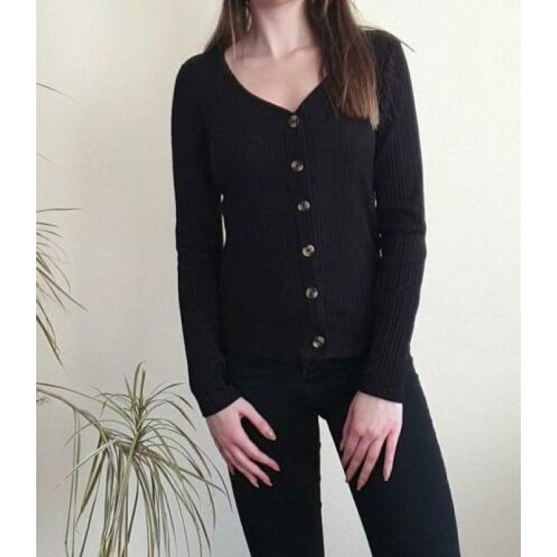 Zwarte top met knopen