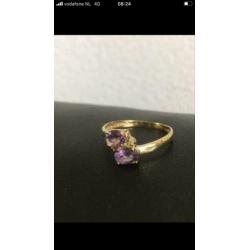 Prachtige NW 9 krt gouden ring met 2 facet gesl. amethisten