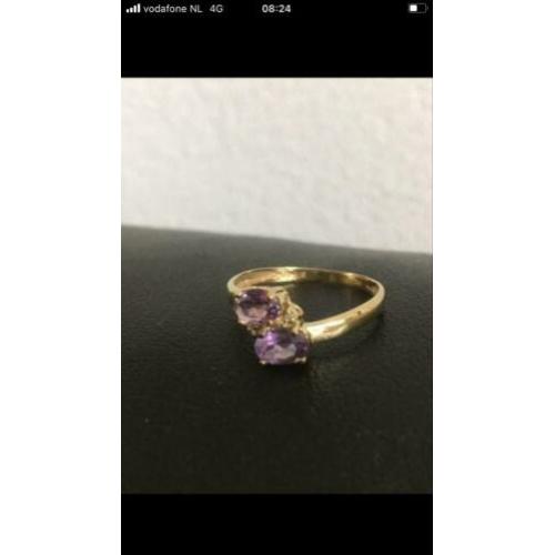 Prachtige NW 9 krt gouden ring met 2 facet gesl. amethisten
