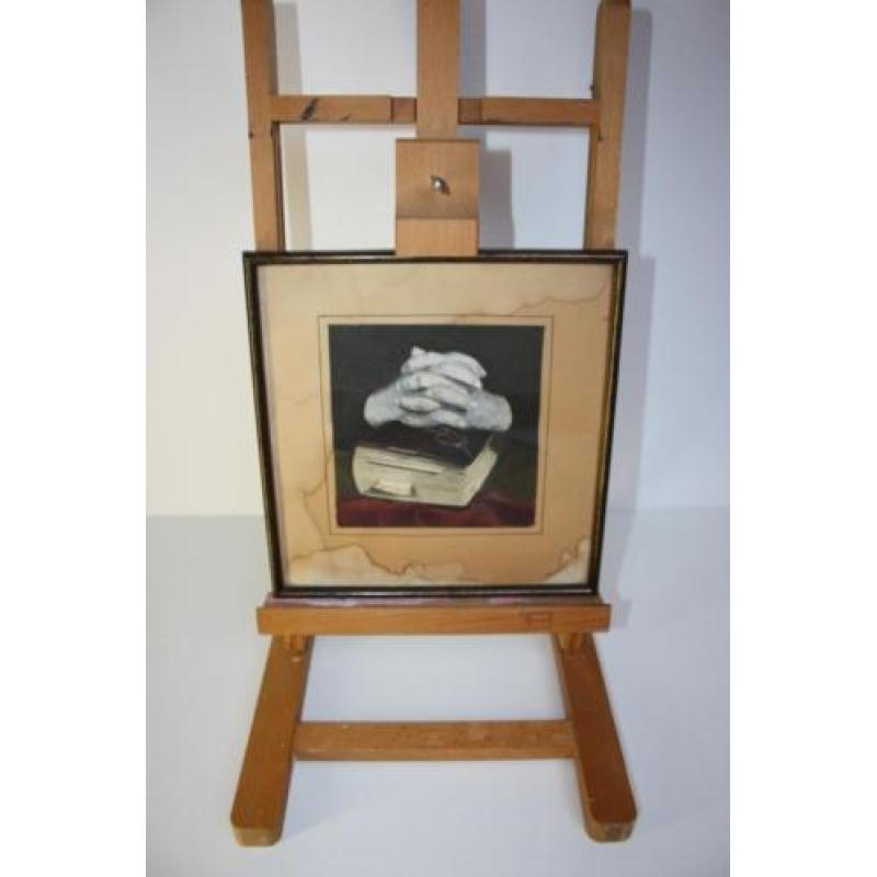 Te koop klein religieus schilderij met handen en Bijbel