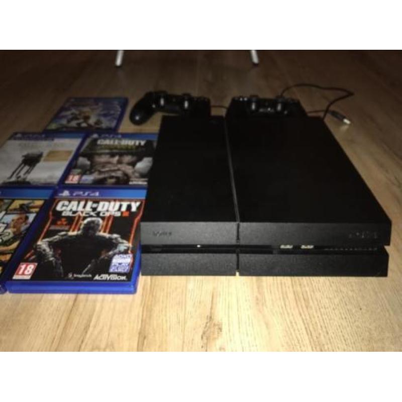 PS4 1 TB met 2 controllers en vijf spellen